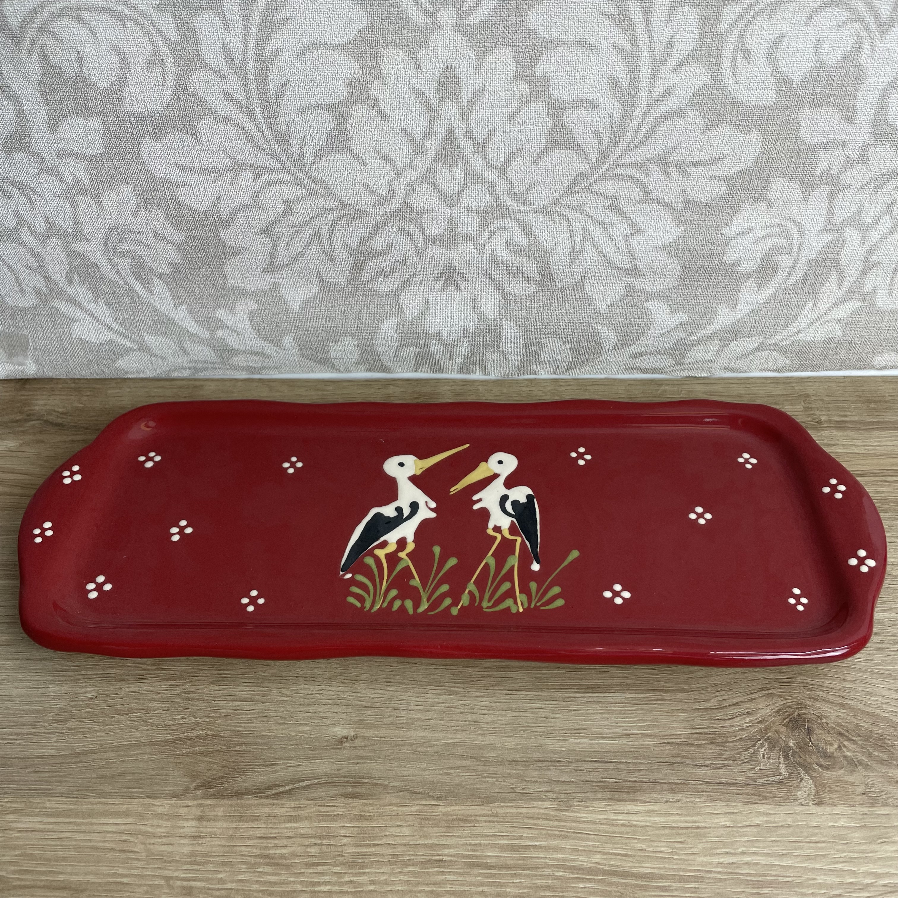 Cake dish red with stork